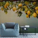 Wall murals Lemons hanging from branch above