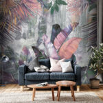 Wall murals Colorful tropical leaves against wall.