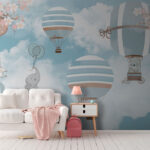 Wall murals Group of elephants flying in a hot air balloon