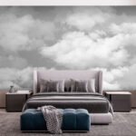 Wall murals Fluffy clouds in a gray sky.