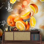 Wall murals Oranges falling into water with water splashing