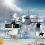 Wall murals Airplane cruising above fluffy clouds.