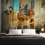 Wall murals Stone building with a balcony