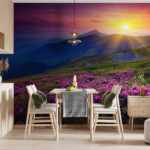 Wall murals Field of flowers with the sun setting behind it