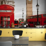 Wall murals Red telephone booth in a city