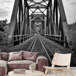Wall murals Train tracks going through a bridge