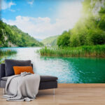 Wall murals Body of water with grass and trees around it