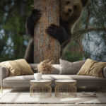 Wall murals Bear peeking from behind the tree
