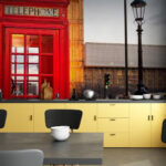 Wall murals Red telephone booth in a city