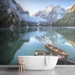 Wall murals Boats rest on serene mountain lake.