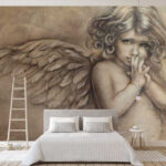 Wall murals Pensive angel with soft wings.