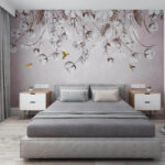 Wall mural Yellow bird flying in the sky