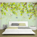 Wall murals Green leaves and butterflies on a white background