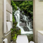 Wall murals Rushing water cascades down rocks.