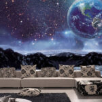 Wall murals Earth above snowy mountain peaks.