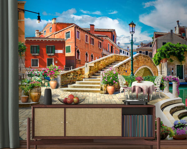Patio with a table and chairs and a fountain in front of a building Wall murals Patio with a table and chairs and a fountain in front of a building