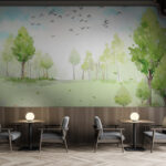 Wall murals Green field with trees and birds flying in the sky