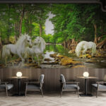 Wall murals Group of white unicorns in a river