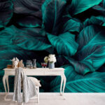 Wall murals Lush leaves in deep turquoise tones