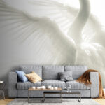 Wall murals White swan with wings spread out in water
