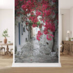 Wall murals Bougainvillea brightens the narrow alleyway.