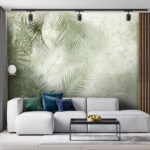 Wall murals Tropical leaves on textured background.