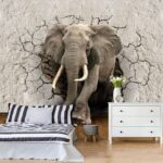 Wall murals Elephant bursting through the wall.