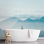 Wall mural Blue sky with mountains in the distance