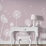 Wall murals Dandelions drifting in the breeze.
