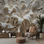 Wall mural White flower sculpture on a wall