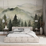 Wall mural Foggy mountain range with trees