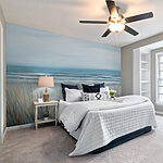Wall mural Beach with grass and waves