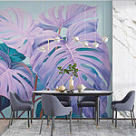 Wall murals Lush tropical leaves in soft hues
