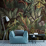 Wall mural Leopard hidden in lush jungle foliage