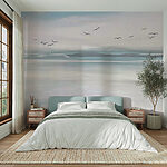 Wall mural Birds flying over a body of water