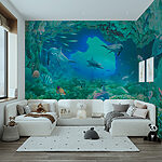 Wall mural Dolphin swimming in the water
