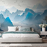 Wall mural Group of birds flying in the sky