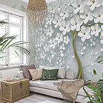 Wall mural Elegant white blossoms on twisting branches