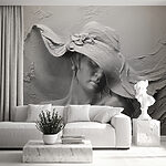 Wall mural Sculpture of a woman wearing a hat