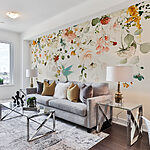 Wall mural Hummingbird hovers beneath floral arch