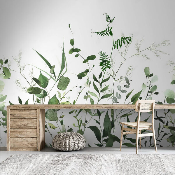 Wall mural Green leaves on white background