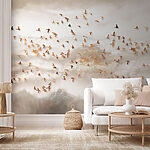 Wall mural Group of birds flying in the sky