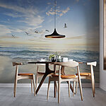 Wall mural Birds flying in the sky