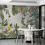 Wall mural Blue and yellow parrot on a branch