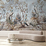 Wall mural Bird flying in the sky