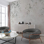 Wall mural White wall with leaves painted on it