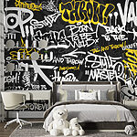 Wall mural Yellow graffiti on a black background