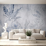 Wall mural Muted jungle leaves on weathered wall