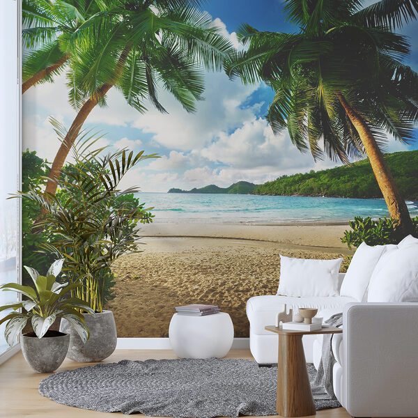 Wall mural Person standing on a beach